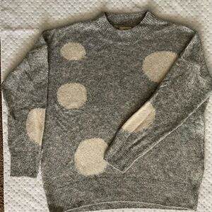 Cozy, fun grey and white polka dot sweater.